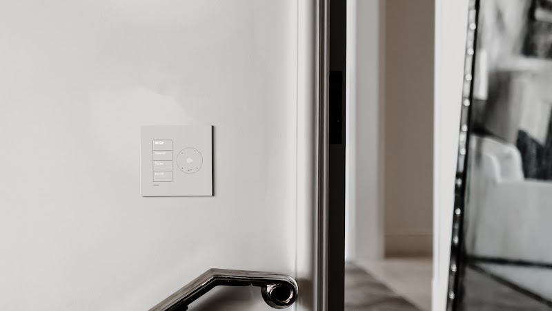 Lutron Josh.ai-Ready wallplate trimmed into a finished home